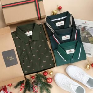 Flat lay of polo shirts with Christmas decor, perfect for holiday fashion shopping.